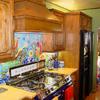 ALDER KITCHEN WITH WOOD RANGE HOOD